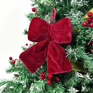 Velvet burgundy oversized Christmas tree bow with silk hanging loop for holiday decor