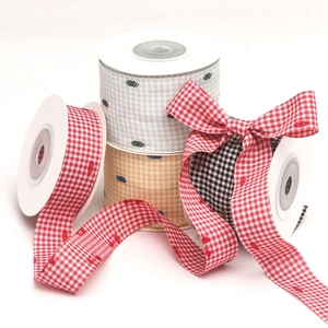 Detail of colorful flocked polka dot houndstooth ribbon bows for DIY craft and gift decor