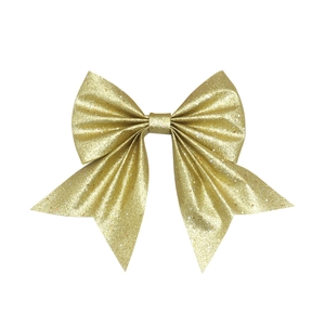 Handmade gold glitter Christmas bow ornament for holiday wreaths and gift wrapping decor