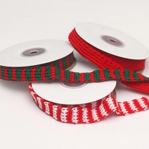 Three-color festive knit ribbons in red, red-green, and red-white on rolls