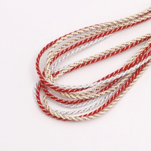 Close-up of 3mm metallic twisted cord showing texture of the gold silk glitter rope