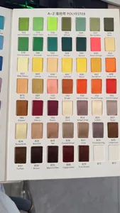 Detailed color chart of 1cm polka dot polyester ribbons showing various shades and codes