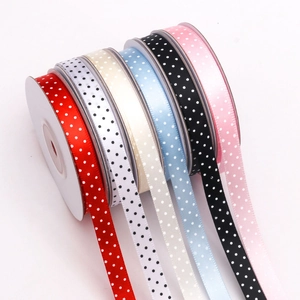 Detailed close-up of 1cm polka dot printed satin ribbons in six vibrant various colors