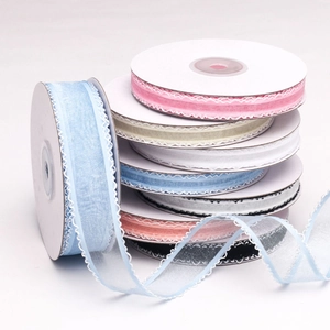 Detail of ruffled chiffon lace ribbons in multiple colors for DIY handmade crafts