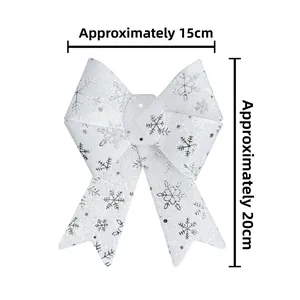 White Christmas bow with silver snowflakes measuring approximately 15cm width and 20cm height
