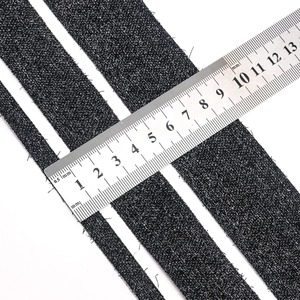 Three widths of black nylon hook and loop tape measured by ruler at 10mm 20mm and 40mm