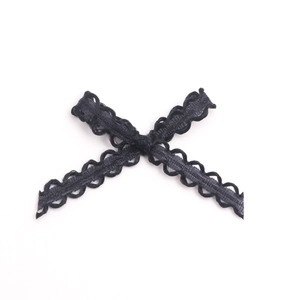 Black 0.3cm polyester lace trim with hollow wave pattern in a crossed display