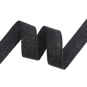Elegant black woven ribbon with silver glitter texture for gift wrapping and DIY crafts