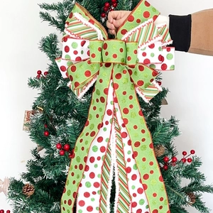 Large Christmas bow with red green polka dots and glitter ribbons for tree topper