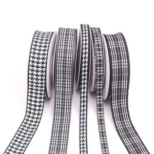 Detail of black and white houndstooth ribbons for DIY hair accessories and floral gift wrapping