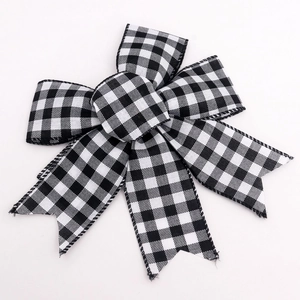 Classic black and white buffalo check burlap Christmas bow with swallowtail design
