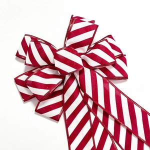 Large red and white diagonal stripe Christmas bow decoration for trees and wreaths