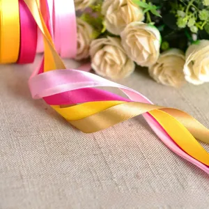 Close-up of multicolored 1cm satin ribbons showing soft gloss and smooth texture