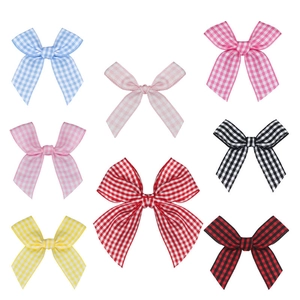 Set of eight colorful gingham plaid ribbon bows for hair accessories and gift wrapping
