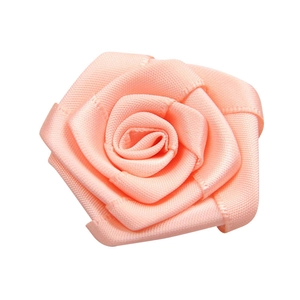 Handmade polyester satin ribbon rose in light pink for gift wrapping and DIY accessories