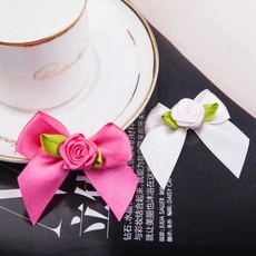 Handmade rose satin ribbon bows in rose pink and white colors for gift box decoration
