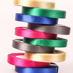 Stack of multi-color satin ribbons with smooth finish for gift wrapping and DIY crafts