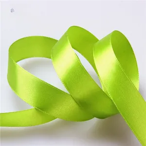Detail of 2cm apple green satin ribbon with smooth silky texture for gift wrapping