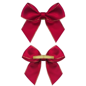 Red satin bow tie with gold metallic edge trim and wire twist tie for gift packaging