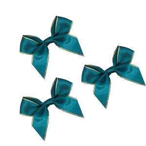 Dark teal satin bows with elegant gold edge stitching for gift wrapping and decorations