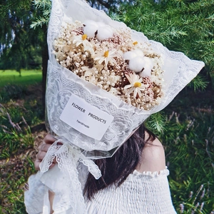 Exquisite handmade dried flower bouquet wrapped in 3cm wide white lace ribbon and bow