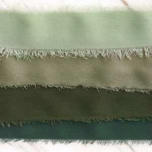 Detail of gradient green handmade frayed edge chiffon ribbons for wedding bouquets