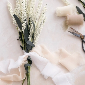 Frayed edge chiffon ribbons in cream and pink colors for wedding bouquets and DIY crafts