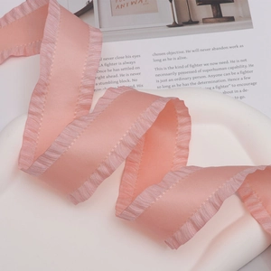 Peach pink ruffled chiffon ribbon with pleated edges for DIY gift wrapping and crafts