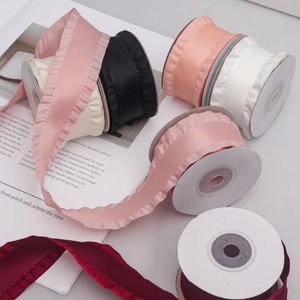 Detailed view of 4cm colorful pleated ruffle edge satin ribbons for gift wrapping