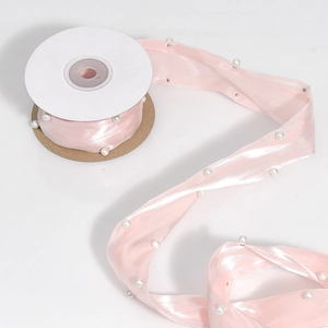 Pink satin ribbon with white pearl beads on edge, perfect for floral gift wrapping DIY