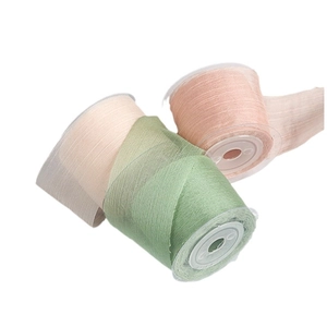 Three-roll chiffon ribbon set in sage green, dusty pink, and cream for gift wrapping
