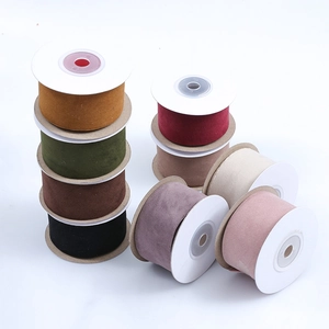 Multiple rolls of 40mm solid color faux suede ribbons in vintage Morandi tones for DIY crafts