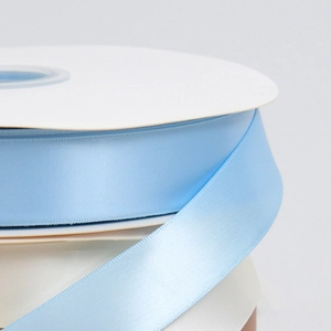 Light blue double-sided satin ribbon roll for gift wrapping and floral decoration