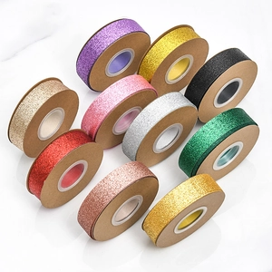Detailed set of ten glitter ribbon rolls in various vibrant colors for DIY crafts