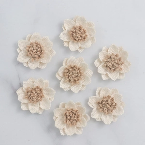 Set of seven handmade burlap roses with jute twine center for rustic DIY craft projects