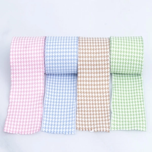 Detailed view of 4cm houndstooth fabric ribbons in pink, blue, brown, and green colors