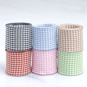 Detail view showing six color variations of houndstooth ribbon for DIY craft accessories
