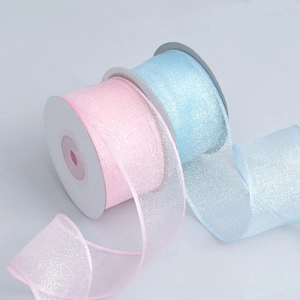 Detail view of light pink and blue iridescent sheer ribbons for DIY craft projects