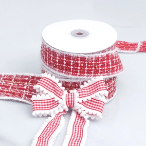Red and white tweed ribbon with gold silk fringe and festive plush ball bow decoration