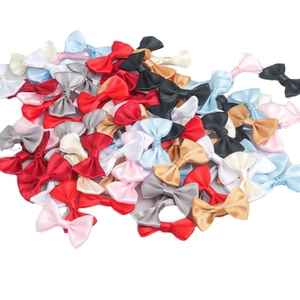 Handmade 2.5x4cm satin polyester bows in various vibrant colors for DIY crafts and decor
