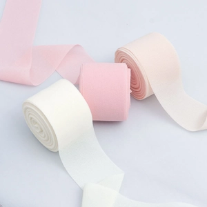 Detailed texture of white and pink chiffon ribbons for DIY wedding bouquets