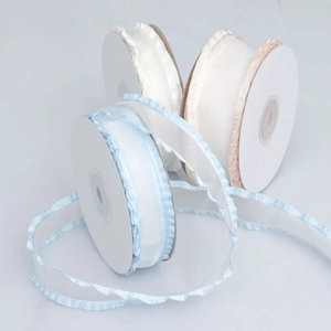 Ruffled edge chiffon ribbons in blue, white, and pink for gift wrapping and DIY crafts