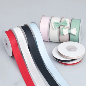 Close-up of matte polyester ribbons in various colors with handmade decorative bows