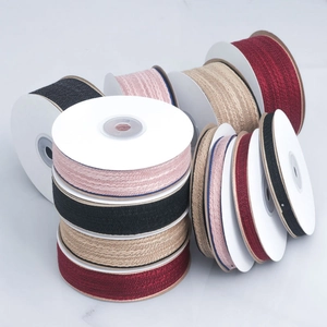 Rolls of textured double-sided cotton ribbon for DIY hair bows and garment accessories