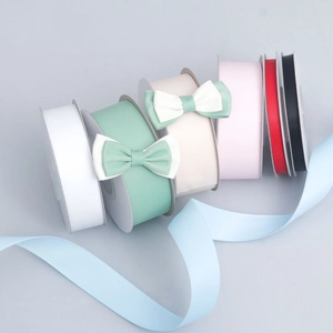 Polyester satin ribbons in multiple colors on cards for DIY crafts and hair bows