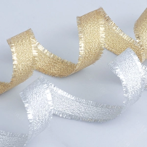 Detailed S-curve layout showing gold and silver metallic ribbons with frayed fringe edges