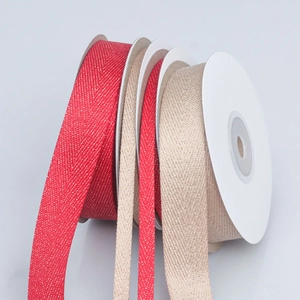 Red and gold herringbone polyester ribbon rolls with metallic sparkle for DIY crafts