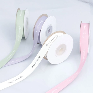 Close-up of Special Day printed satin ribbons in mint green, lavender, white and pink