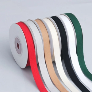 Multiple colors of herringbone cotton ribbon rolls for garment accessories and handles