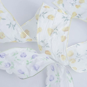 Sheer floral tulip ribbon with metallic gold edges for DIY gift wrapping and hair bows